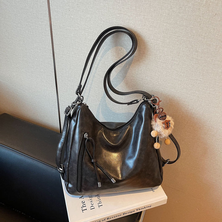 Damen praktische Handtasche mit verspieltem Anhänger Nord Taschen