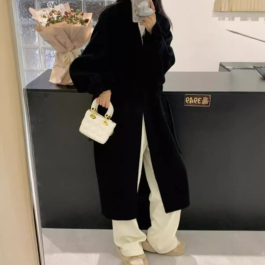 Damen Oversize-Mantel mit tiefsitzender Schulter und langer Silhouette Nord Taschen