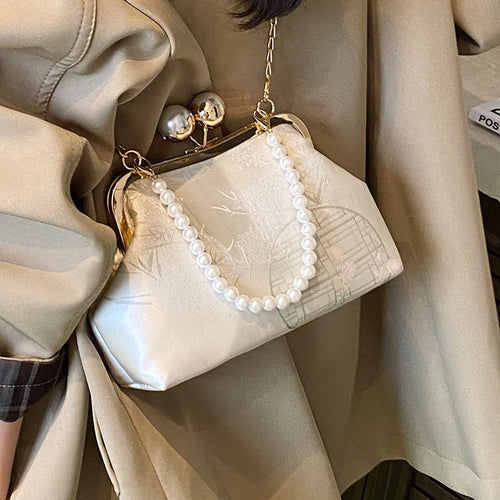 Damen Clutch mit elegantem Perlenschmuck Nord Taschen