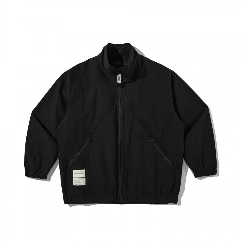 Unisex Leichte Boxy-Utility-Jacke mit Stehkragen, diagonalem Reißverschluss und elastischem Saum Nord Taschen