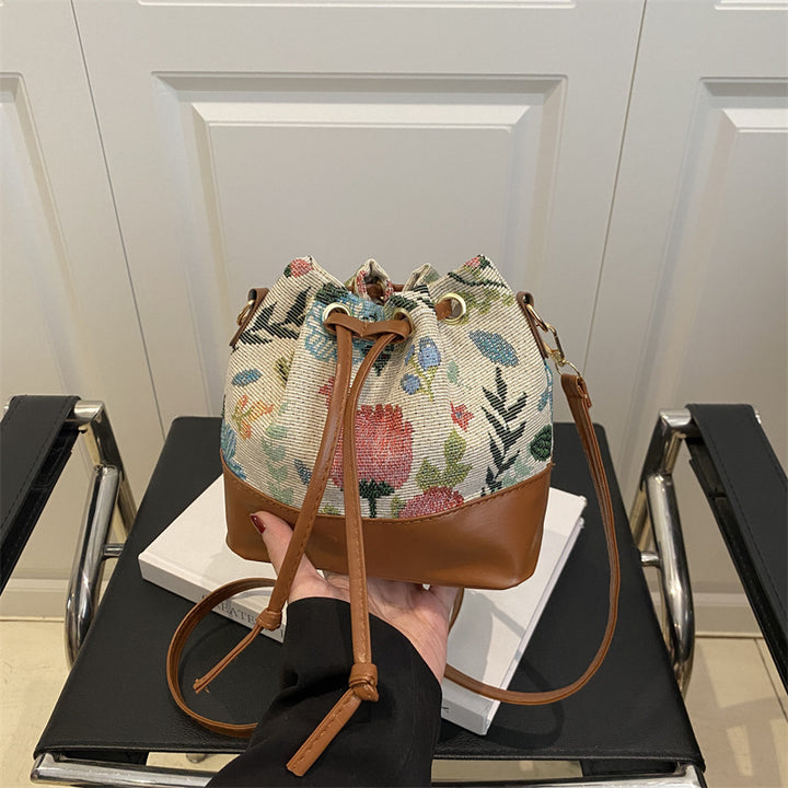 Damen Beuteltasche mit floralem Muster und Lederboden Nord Taschen