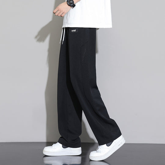 Herren Sportliche Relaxed Fit Jogginghose mit Mesh-Einsätzen