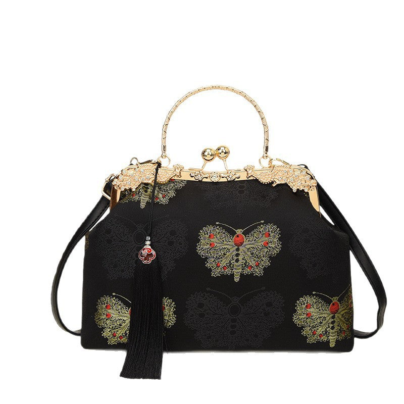 Damen modische Handtasche mit filigranem Schmetterlingsmuster und eleganten Akzenten Nord Taschen