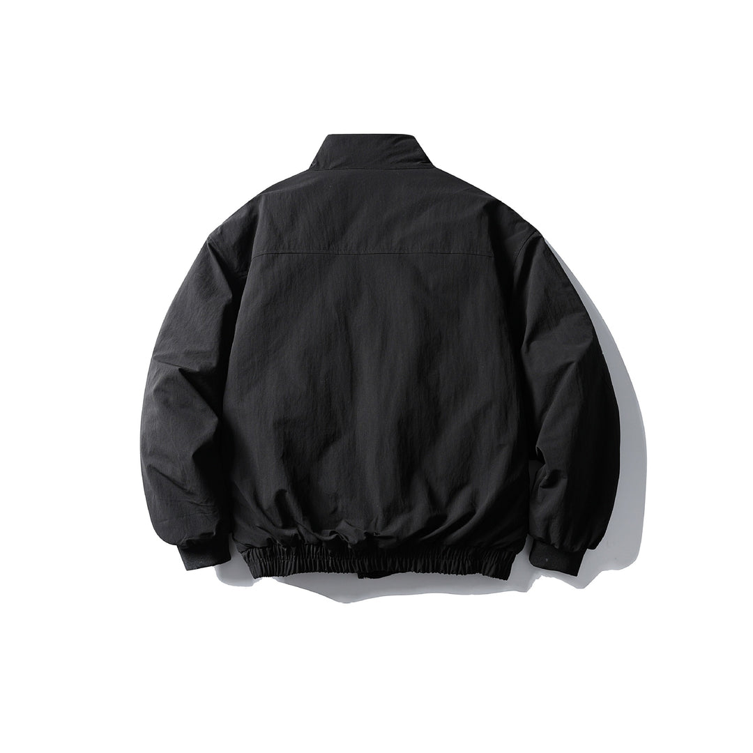 Unisex Boxy-wattierte Kurzjacke mit Funnelkragen und aufgesetzten Pattentaschen Nord Taschen