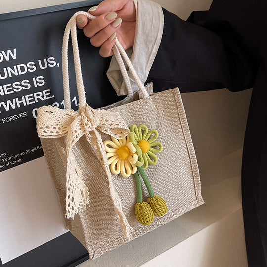 Damen Jute-Strandtasche mit floralem Dekor und verspieltem Schleifenakzent Nord Taschen
