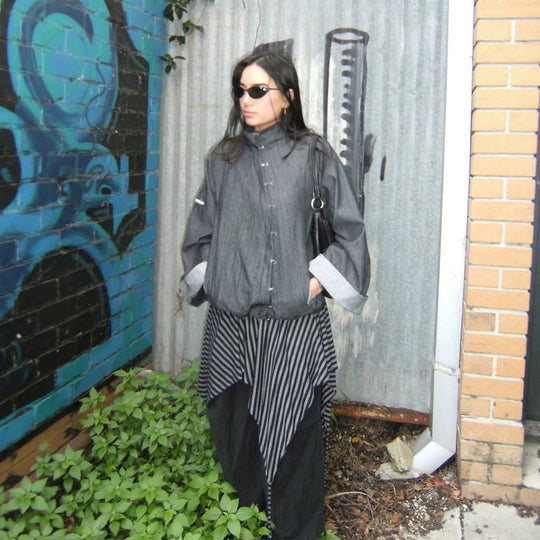 Damen Oversize-Boxy-Jacke mit asymmetrischem Druckknopfverschluss und Ärmeltasche Nord Taschen