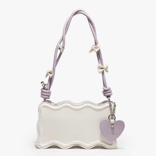 Damen Mini-Handtasche mit kreativem Wellenmuster und verspieltem Anhänger Nord Taschen