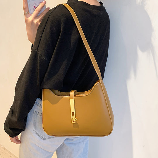 Damen Umhängetasche mit goldenen Akzenten und hochwertiger Oberfläche Nord Taschen