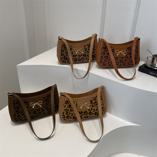 Damen Umhängetasche mit Leopardenmuster und elegantem Kettenriemen Nord Taschen