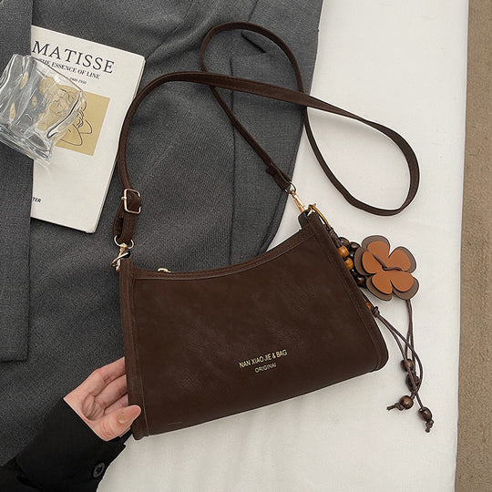 Damen Umhängetasche aus hochwertigem Kunstleder mit elegantem Reißverschluss Nord Taschen