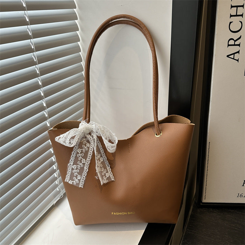 Damen Tote-Tasche aus hochwertigem Kunstleder mit verspieltem Schleifendetail Nord Taschen
