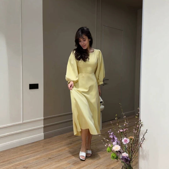 Damen Midikleid mit offenem Rückenausschnitt, voluminösen Puffärmeln und Bindegürtel Nord Taschen