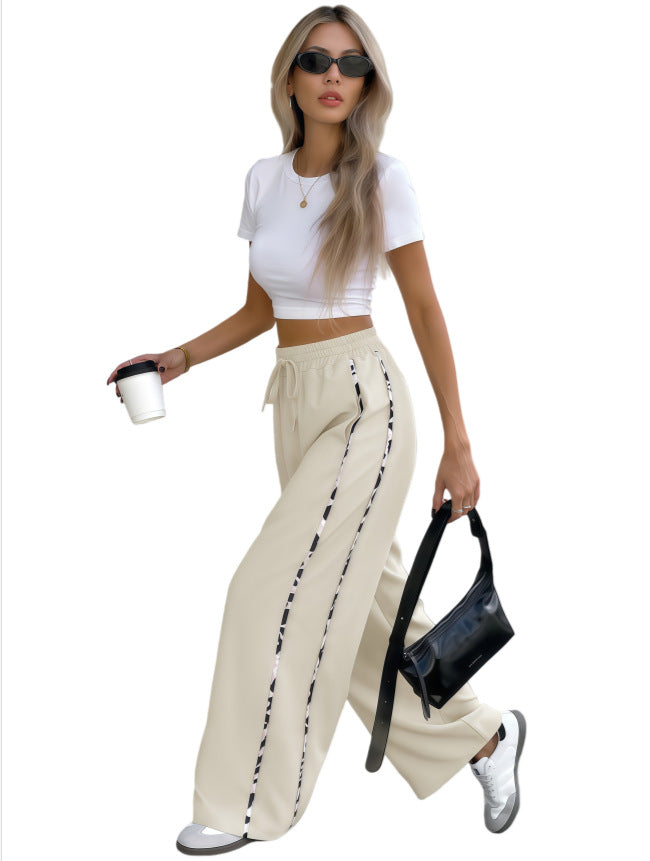 Damen Weite High‑Waist Loungehose mit Kordelzug und kontrastierenden Seitenstreifen Nord Taschen