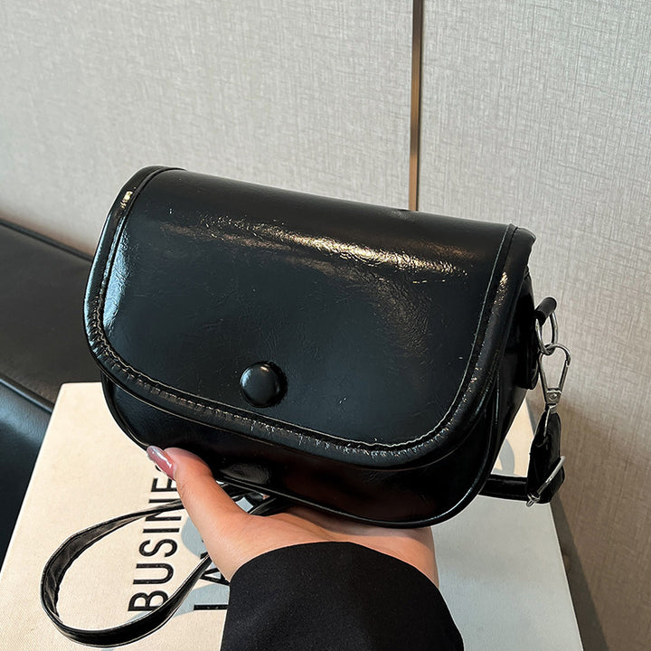 Damen Umhängetasche mit eleganter Klappöffnung und verstellbarem Schultergurt Nord Taschen