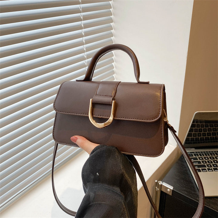 Damen elegante Umhängetasche mit strukturierter Oberfläche und goldenen Akzenten Nord Taschen