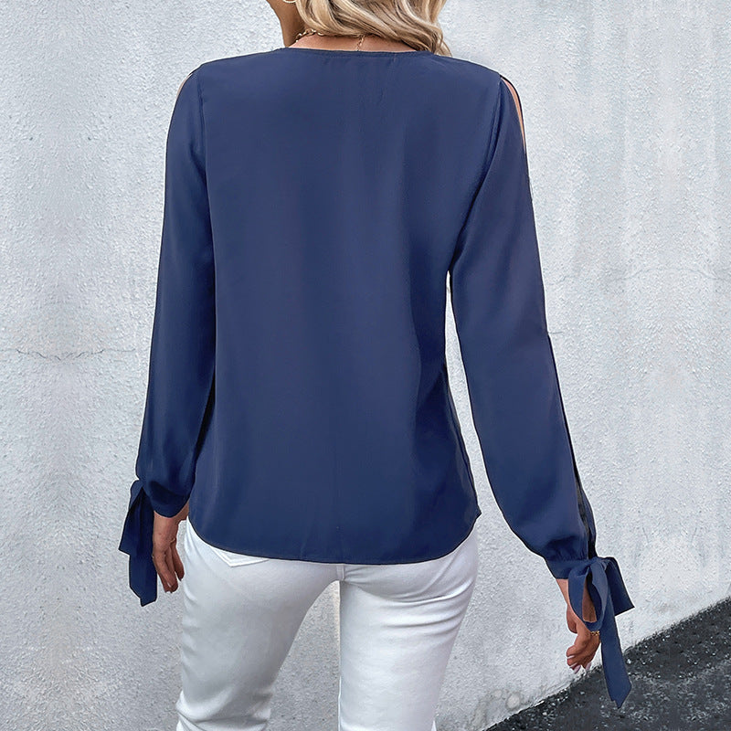 Damen Voile-Bluse mit V-Ausschnitt, Spitzenpasse, Ärmelschlitzen und Schleifenmanschetten Nord Taschen