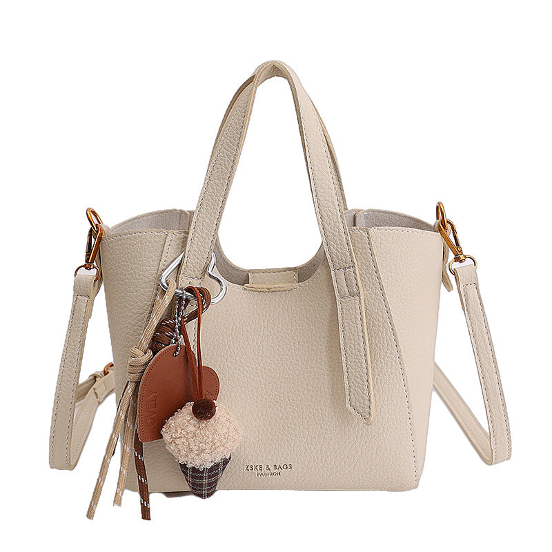 Damen Mini-Handtasche im eleganten Design mit charmantem Anhänger Nord Taschen