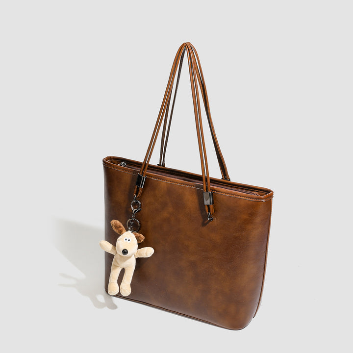 Damen Shopper-Tasche aus hochwertigem Kunstleder mit verspieltem Anhänger Nord Taschen