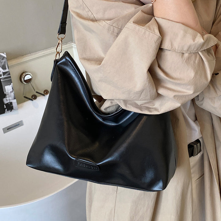 Damen Hobo-Tasche mit elegantem Design und dekorativem Quastenanhänger Nord Taschen