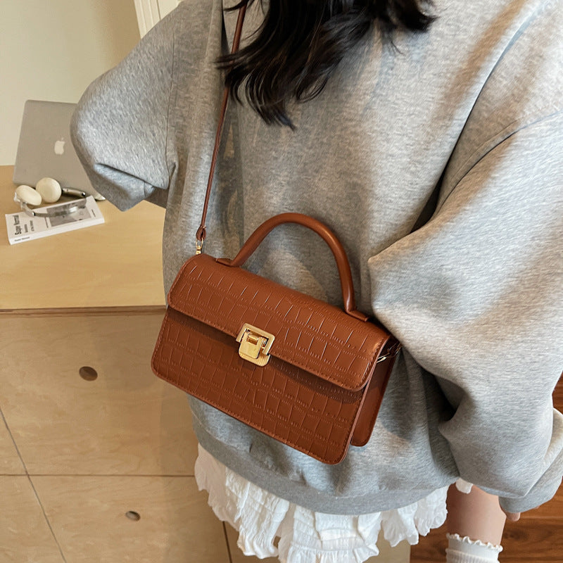 Damen elegante Umhängetasche mit verzierten Krokoprägedetails Nord Taschen