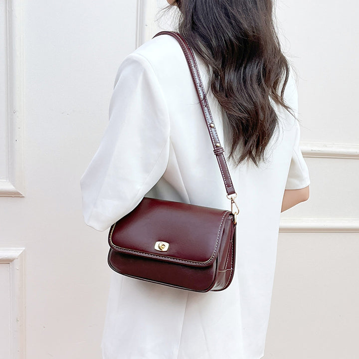 Damen Umhängetasche mit eleganter Klappenöffnung und luxuriösem Kunstleder Nord Taschen