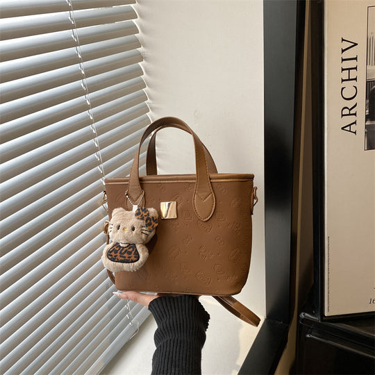 Damen trendige Mini-Tasche mit hochwertigem Krokodilmuster und abnehmbarem Kuscheltier Anhänger Nord Taschen