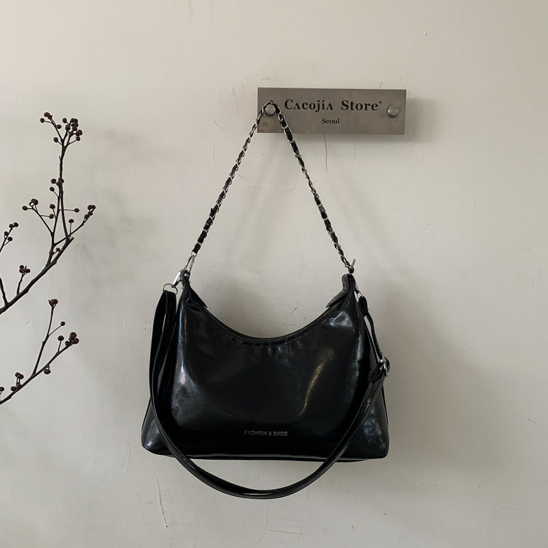 Damen Umhängetasche mit luxuriösem, poliertem Kunstleder und vielseitigem Tragegurt Nord Taschen