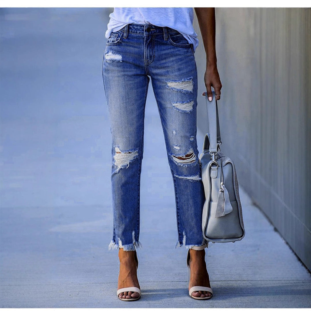 Damen Ripped Jeans im modernen Vintage-Look mit fransigen Säumen