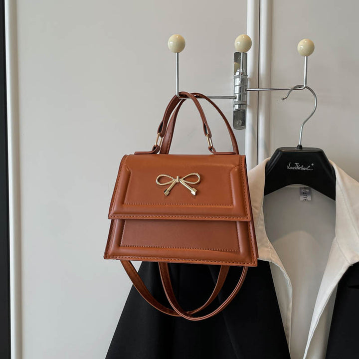 Damen elegante Handtasche mit verspieltem Schleifendesign Nord Taschen