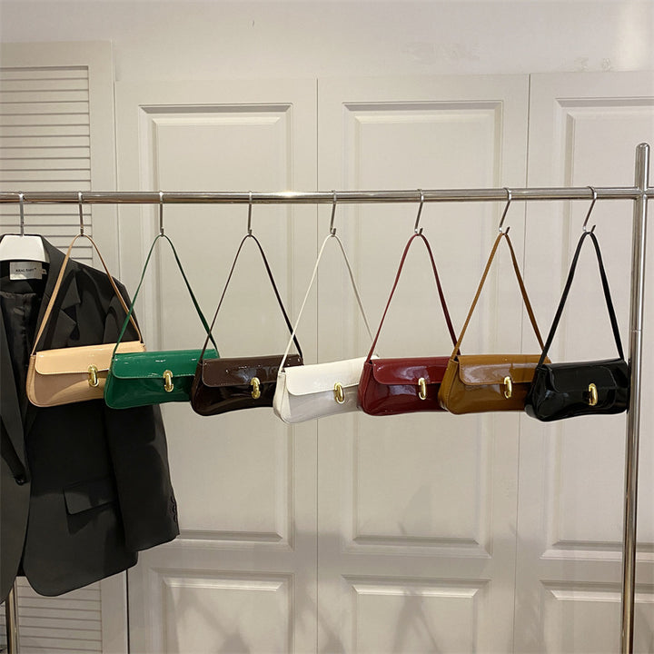 Damen elegante Umhängetasche mit luxuriösem Hochglanzdesign und praktischen Tragegriffen Nord Taschen