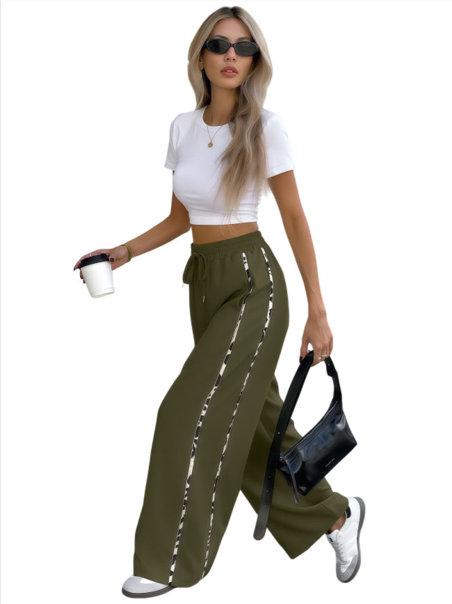 Damen Weite High‑Waist Loungehose mit Kordelzug und kontrastierenden Seitenstreifen Nord Taschen