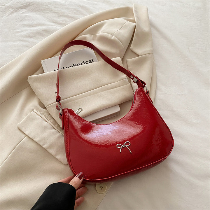 Damen Hobo-Tasche aus glänzendem Kunstleder mit dekorativem Schleifendetail Nord Taschen
