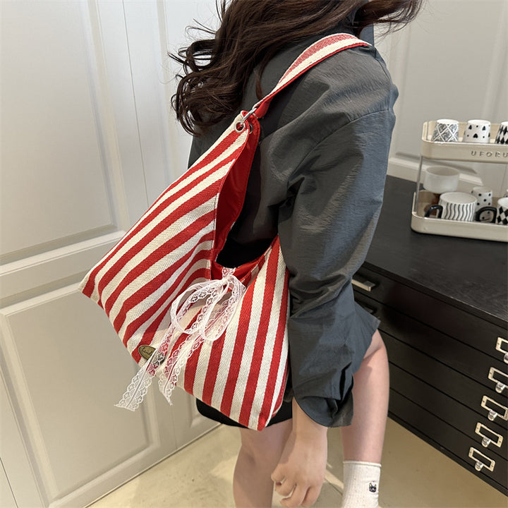 Damen Hobo-Tasche mit modernem Streifenmuster und verspieltem Kordelzug Nord Taschen