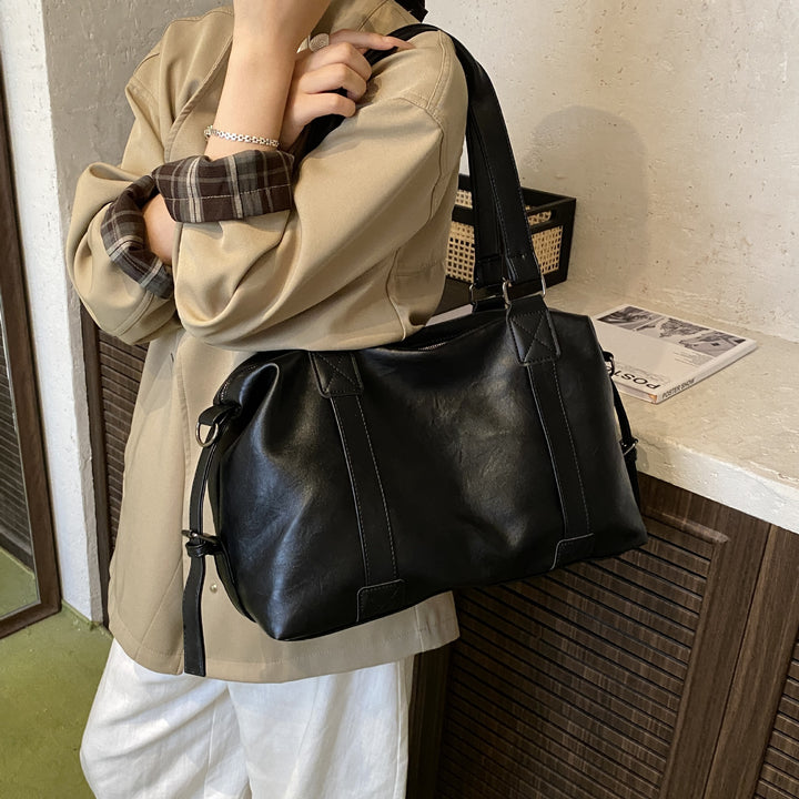 Damen Ledertasche mit geräumigem Innenraum und praktischem Tragegriff Nord Taschen