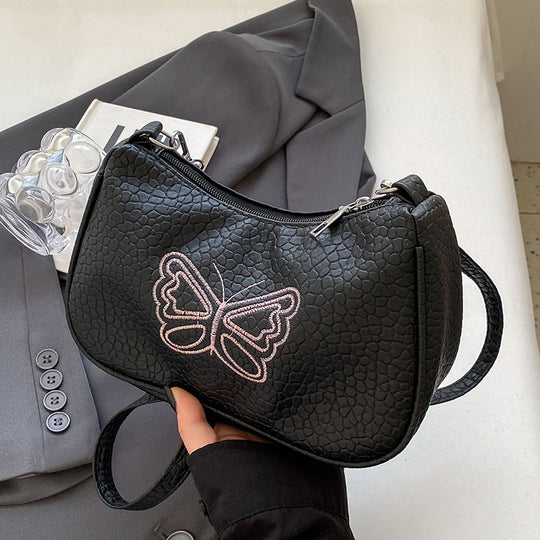 Damen Designer Handtasche mit ausgefallenem Schmetterlingsmotiv Nord Taschen