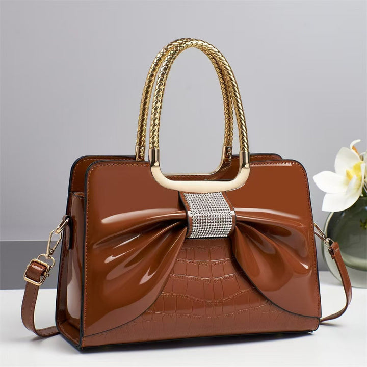 Damen Designer-Handtasche mit schimmerndem Schleifenakzent Nord Taschen