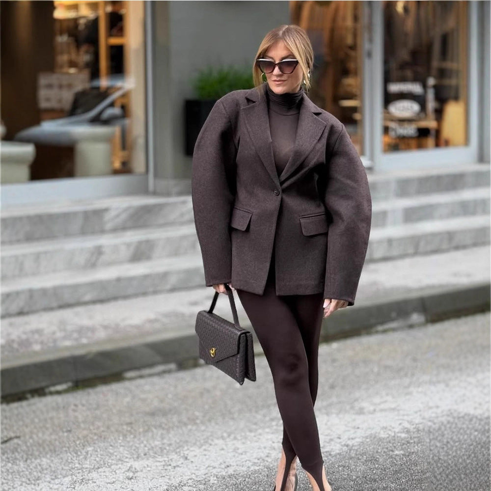 Damen Oversize-Strukturblazer mit betonter Schulterpartie und voluminösen Ärmeln Nord Taschen