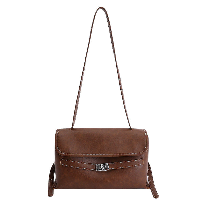 Damen elegante Schultertasche aus hochwertigem Kunstleder mit charmantem Anhänger Nord Taschen