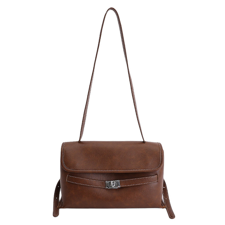 Damen elegante Schultertasche aus hochwertigem Kunstleder mit charmantem Anhänger Nord Taschen