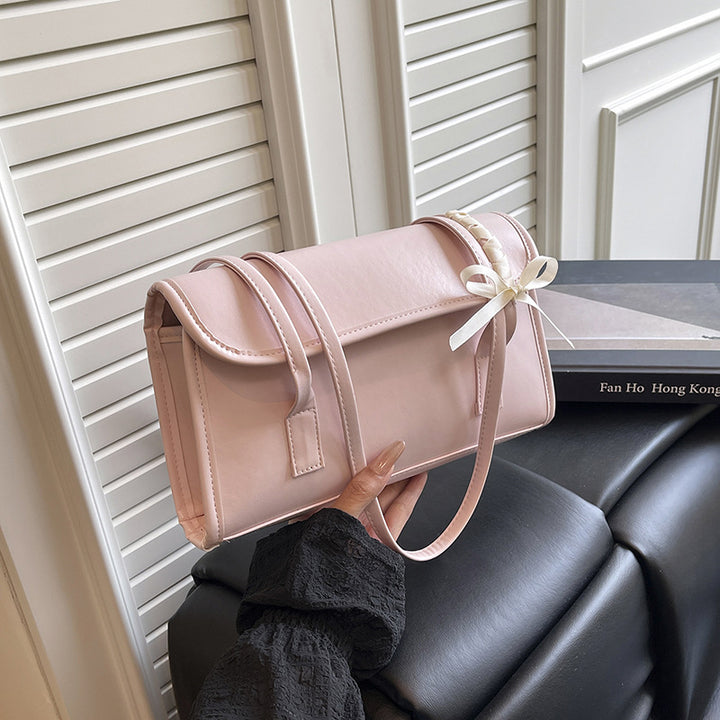 Damen Handtasche aus hochwertigem Kunstleder mit verspieltem Schleifendetail Nord Taschen