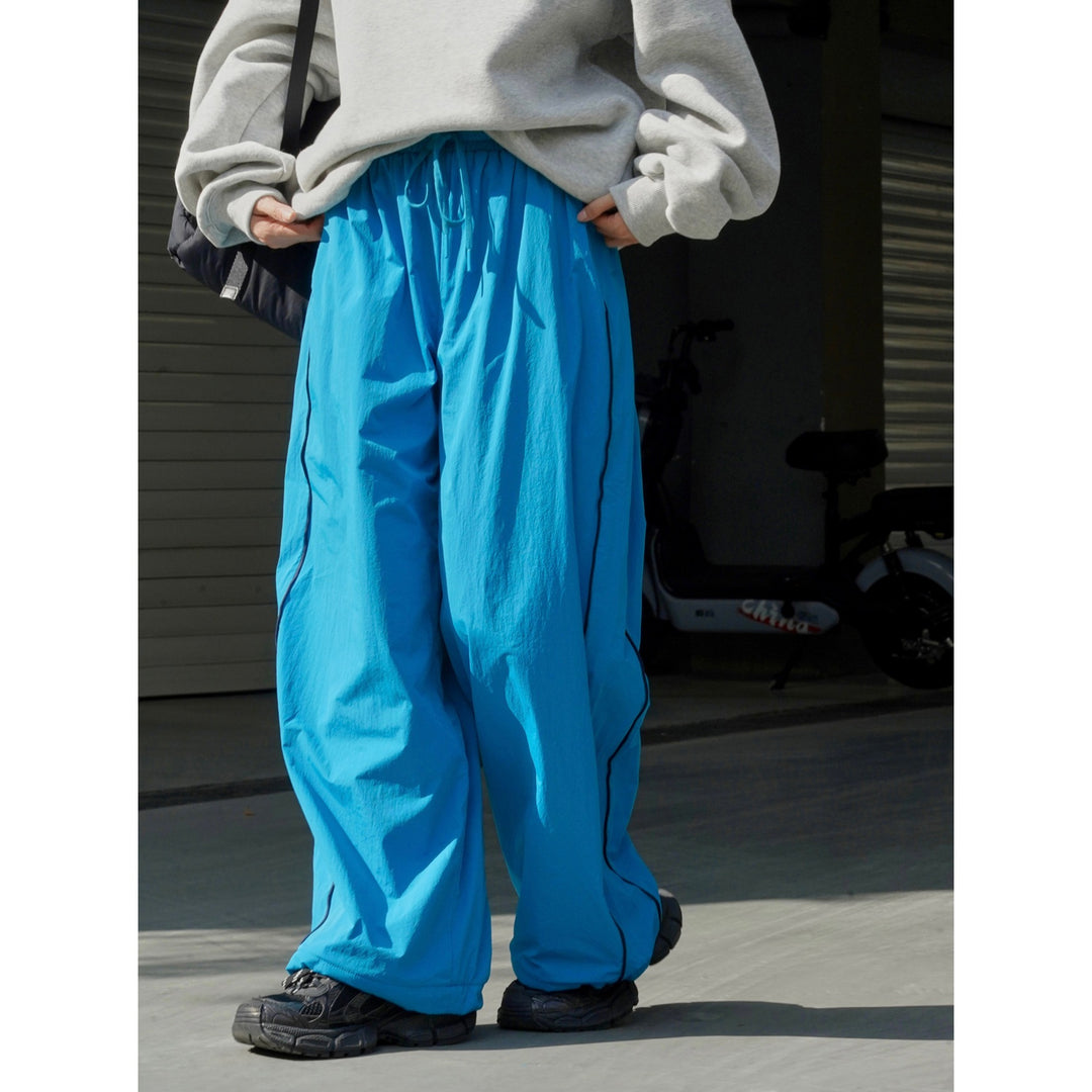 Damen Weite Nylon-Trainingshose mit Kontrastpaspeln und Elastbund Nord Taschen