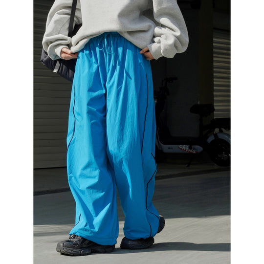 Damen Weite Nylon-Trainingshose mit Kontrastpaspeln und Elastbund Nord Taschen