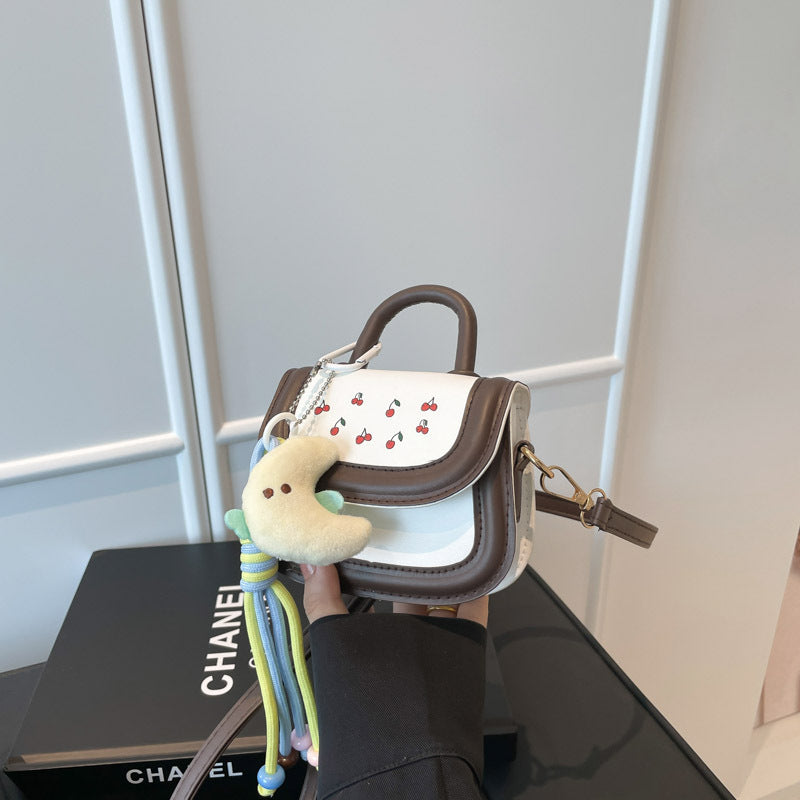 Damen Mini-Handtasche mit fröhlichem Kirschdesign und charmanten Anhängern Nord Taschen