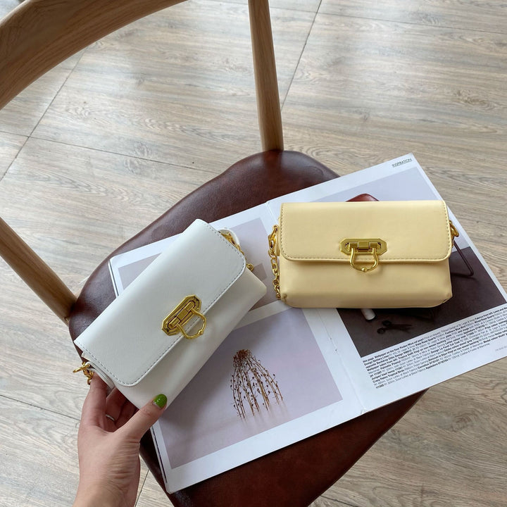 Damen Umhängetasche mit elegantem Kettenriemen und klappbarem Verschluss Nord Taschen