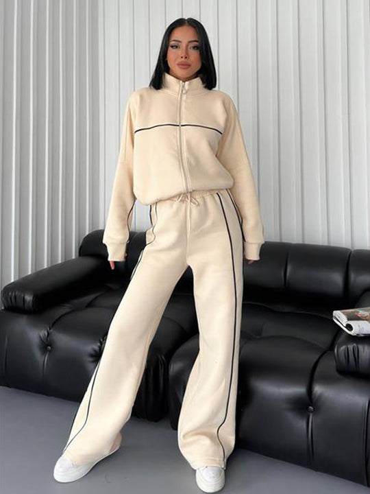 Damen lässiges Sweatset mit Stehkragen Reißverschluss gekürzter Jacke und hochtaillierter Schlaghose Nord Taschen
