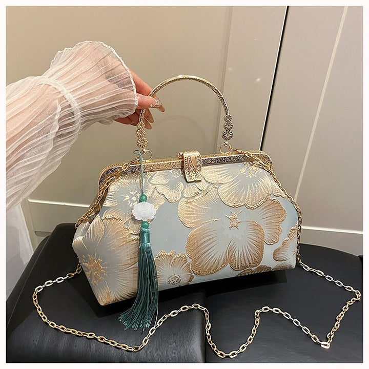 Damen elegante Clutch-Tasche mit floralem Druck und goldenen Akzenten Nord Taschen