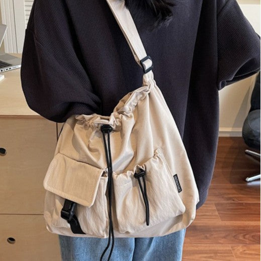 Damen Umhängetasche mit verstellbarem Kordelzug und praktischen Taschen Nord Taschen