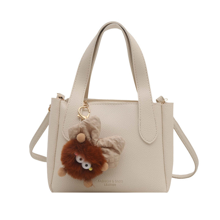 Damen elegante Handtasche mit flauschigem Anhänger Nord Taschen