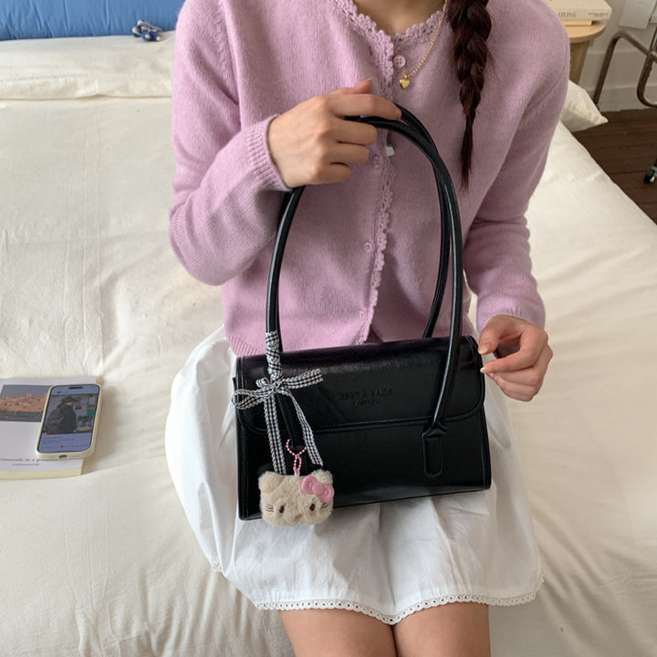 Damen elegante Handtasche mit verspieltem Stoffanhänger Nord Taschen