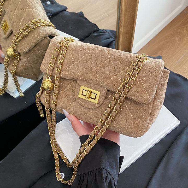 Damen elegante Umhängetasche mit schickem Kettenakzent Nord Taschen